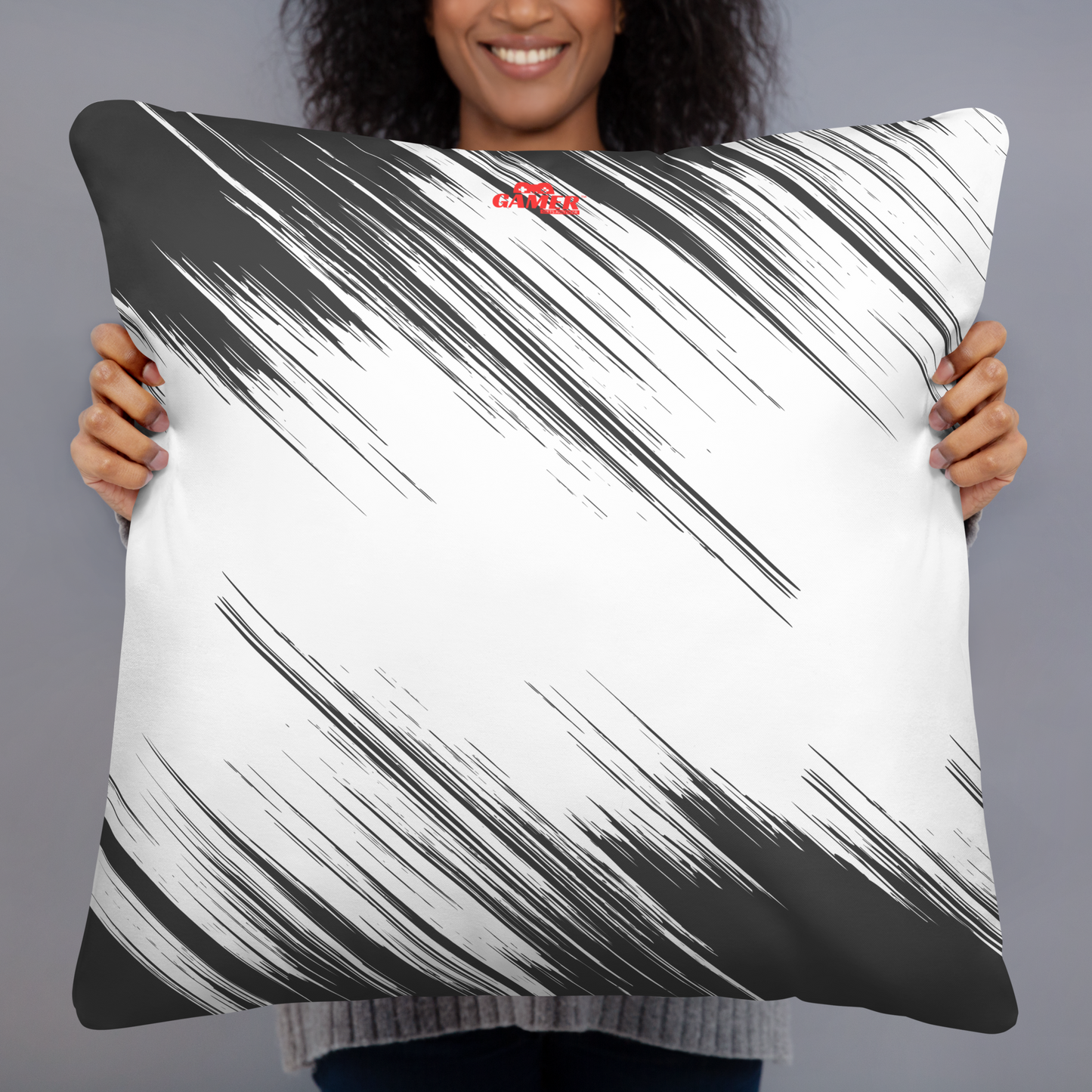 Gamer Gifts and Gear logo on back of grey and white streak pillow