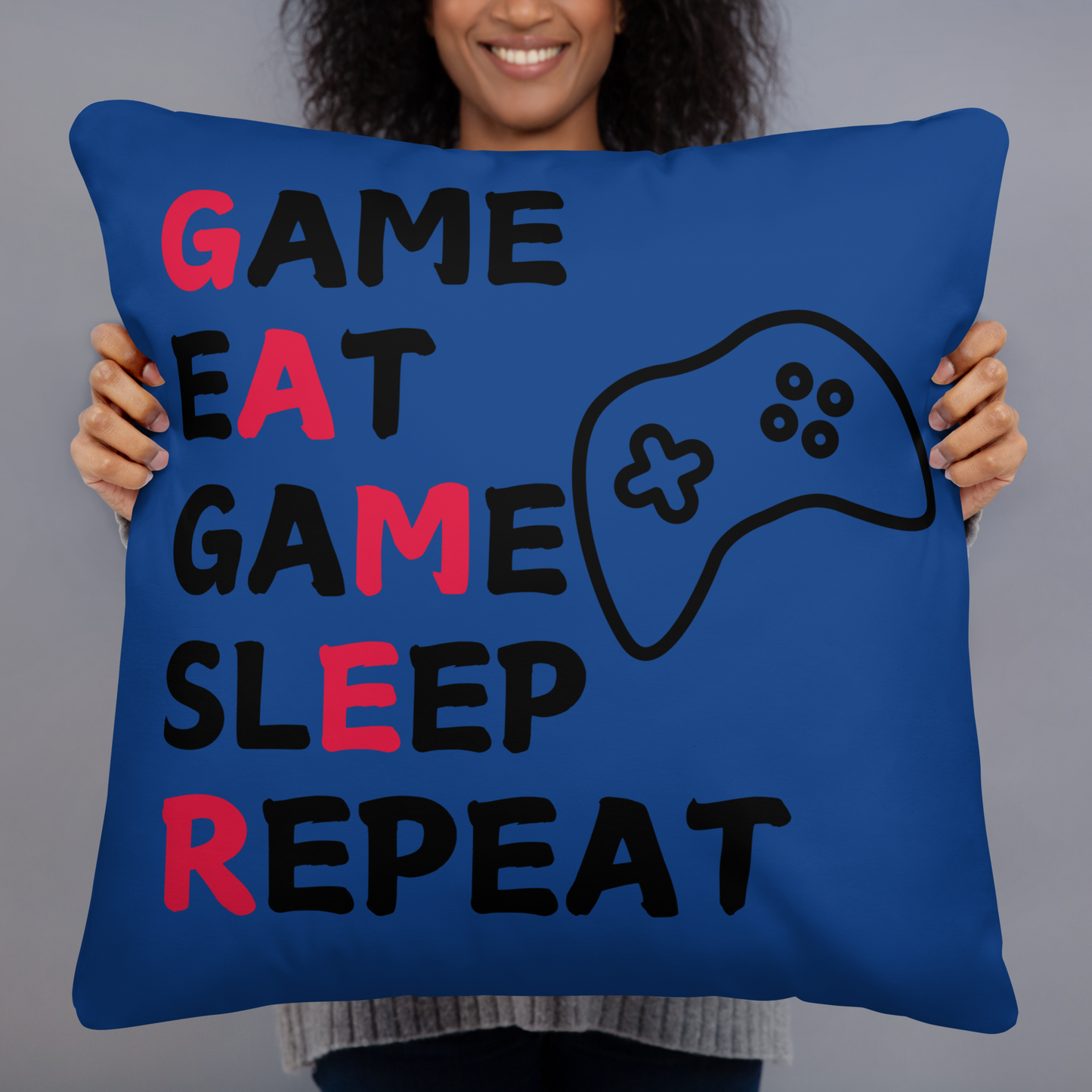 game eat sleep repeat logo on blue pillow