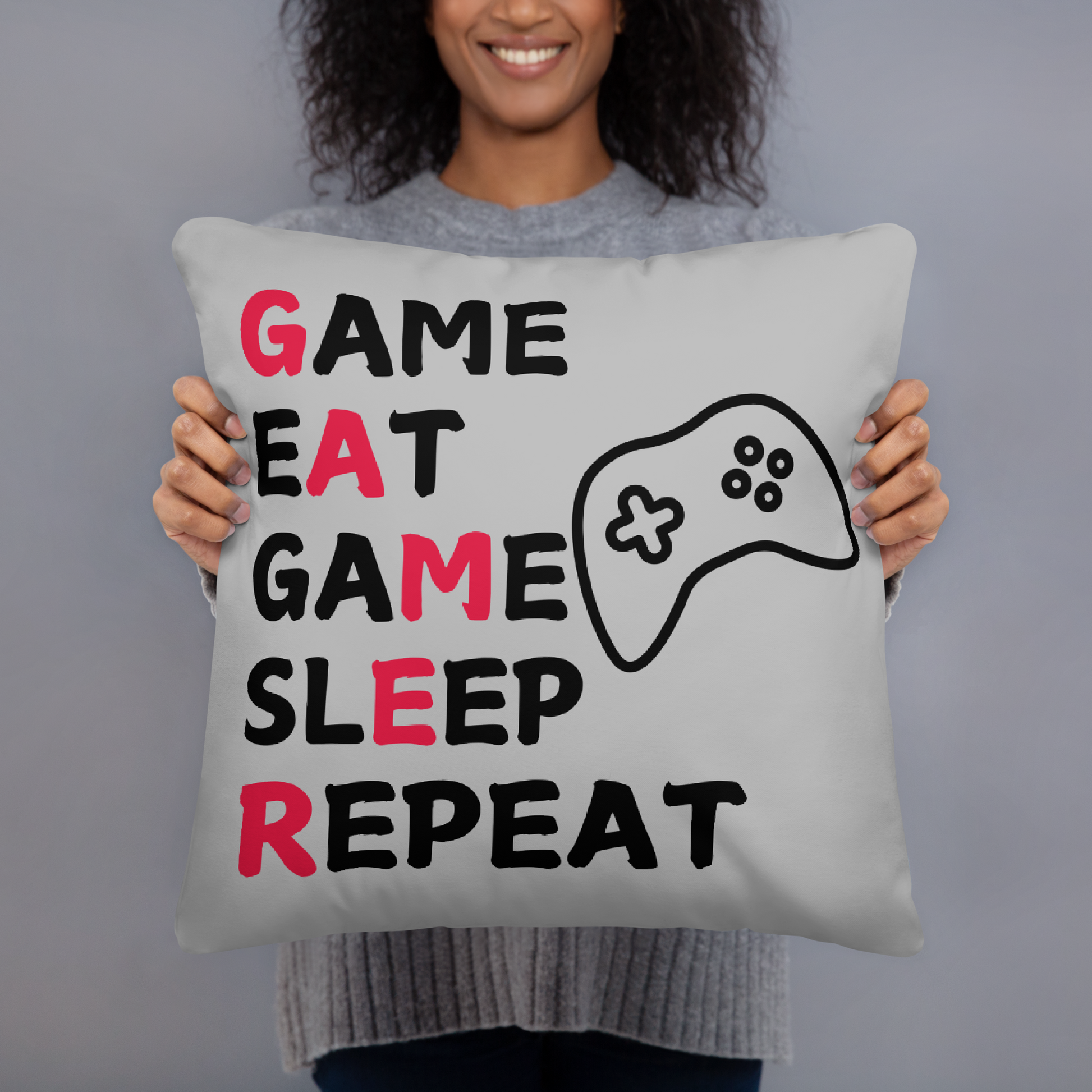 game eat sleep repeat logo on light grey pillow