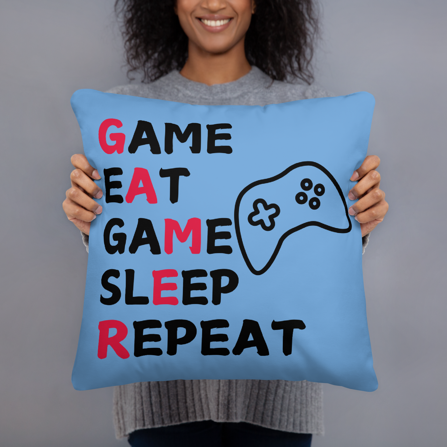 game eat sleep repeat logo on bright blue pillow