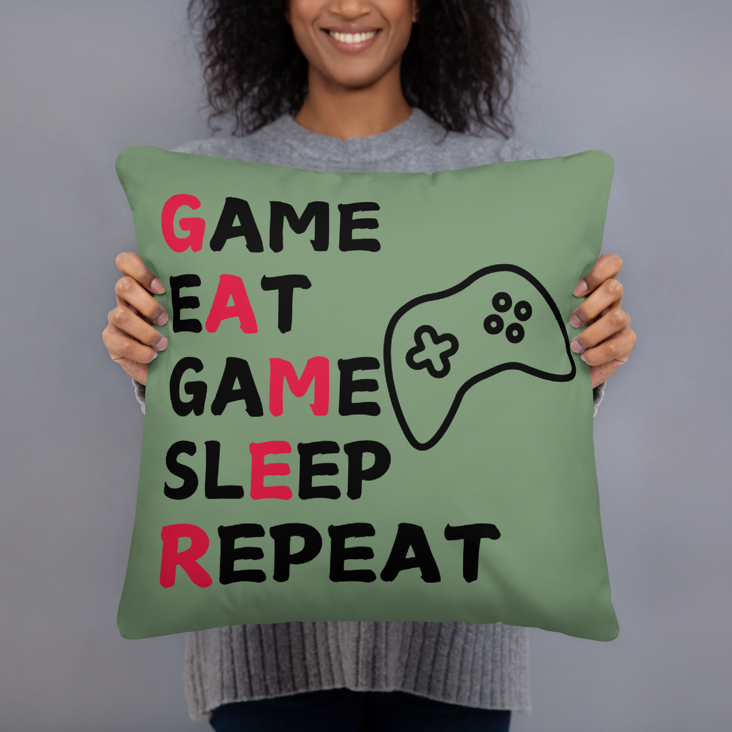 game eat sleep repeat logo on light green pillow