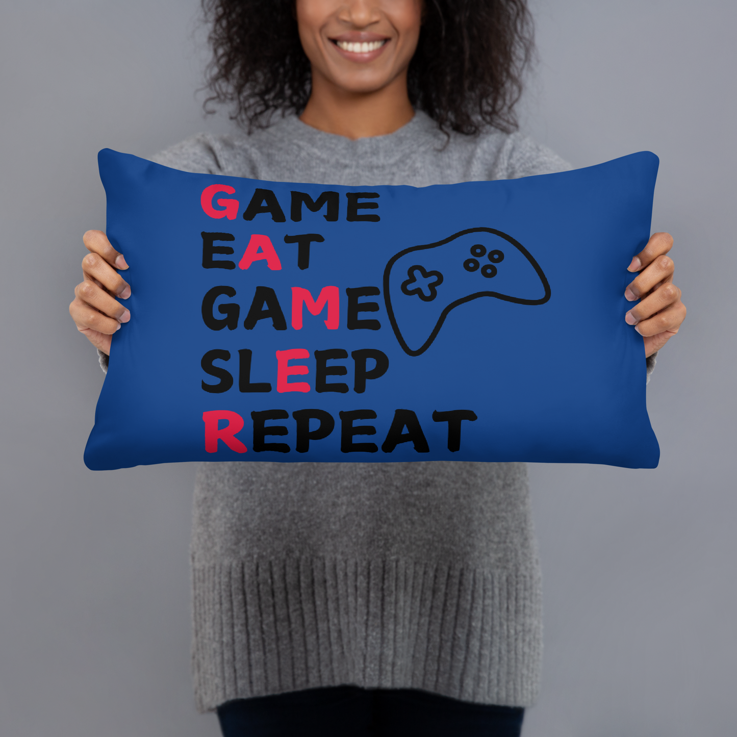 game eat sleep repeat logo on blue pillow