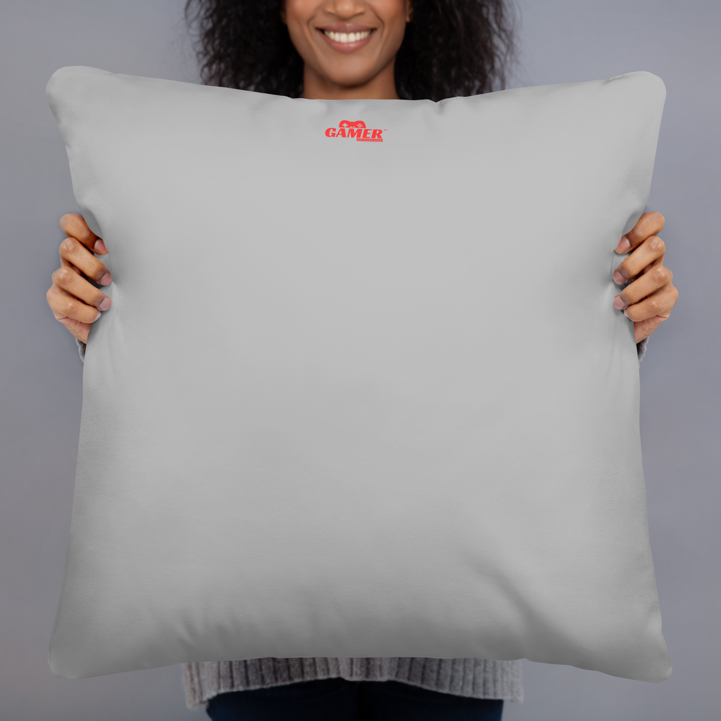 Gamer Gifts and Gear logo on back of light grey pillow