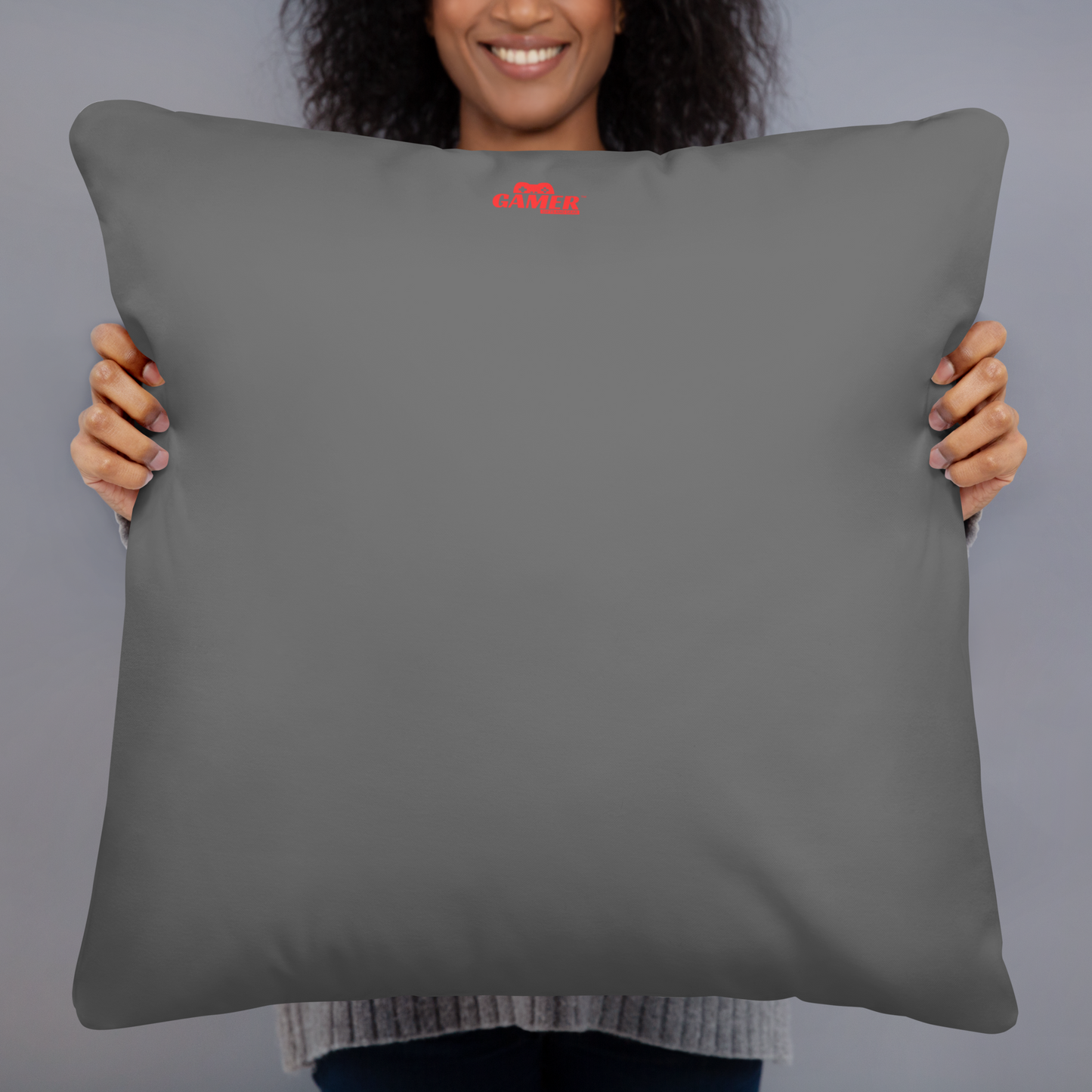 Gamer Gifts and Gear logo on back of dark grey pillow