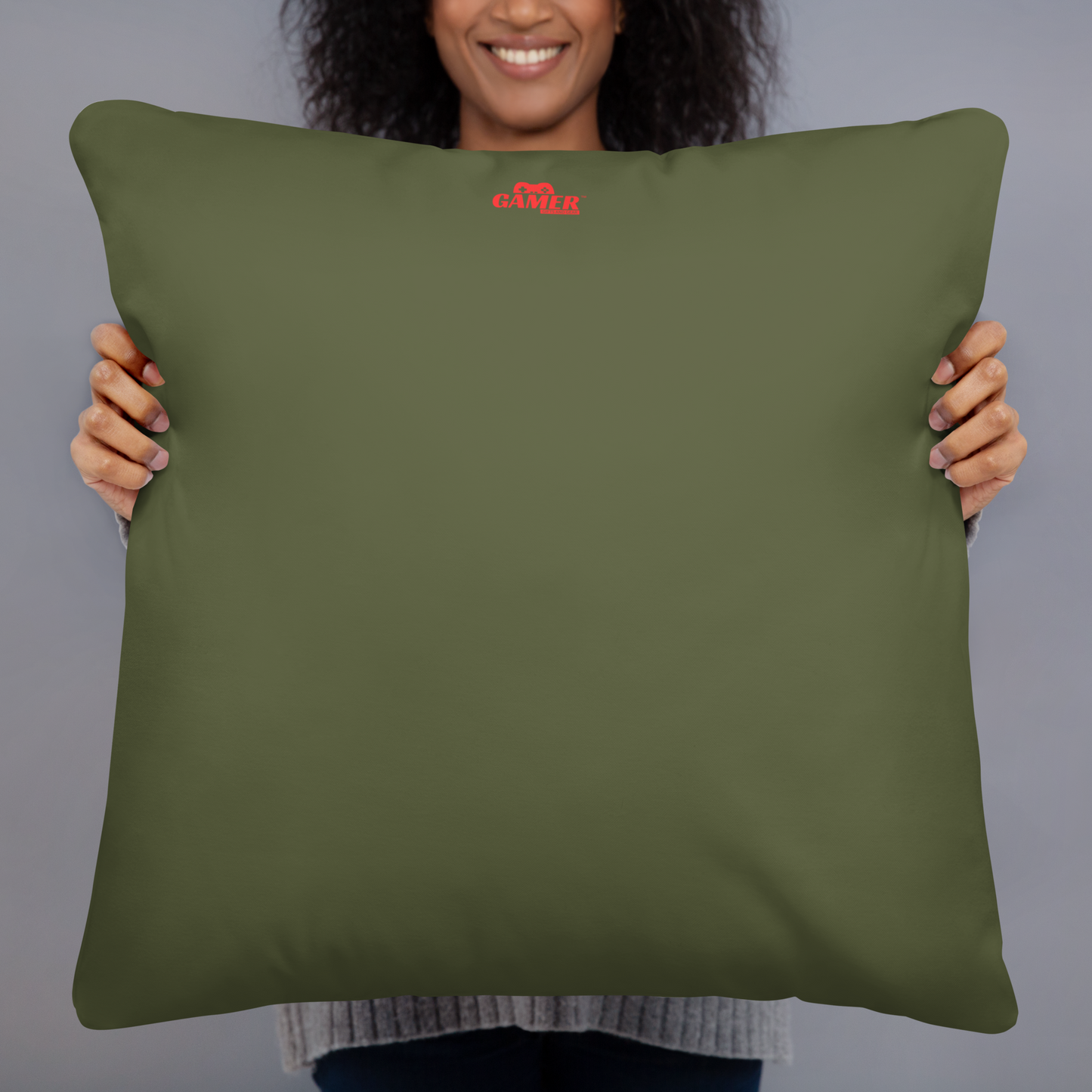 Gamer Gifts and Gear logo on back of dark green pillow