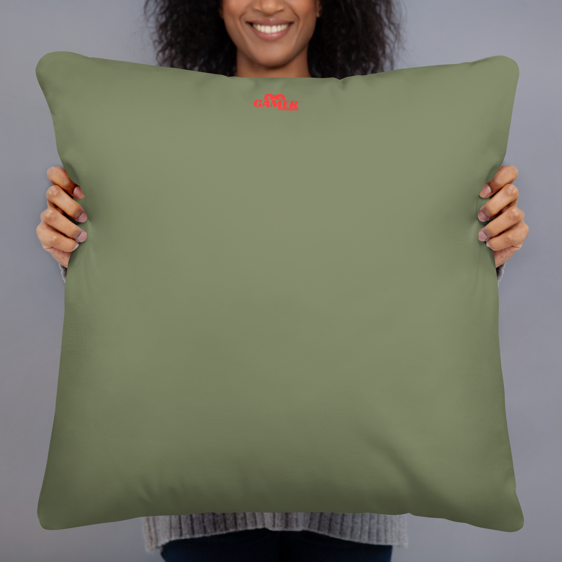 Gamer Gifts and Gear logo on back of green pillow