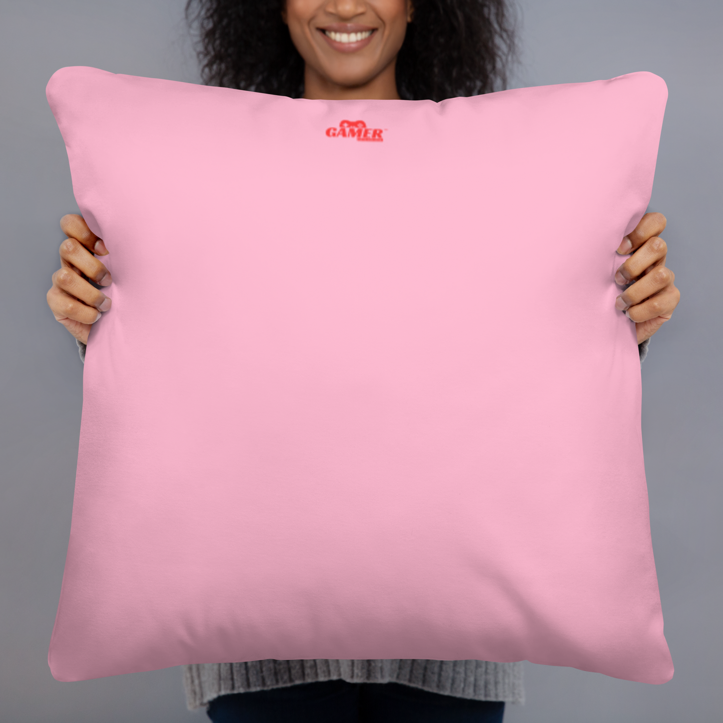 Gamer Gifts and Gear logo on back of bright pink pillow