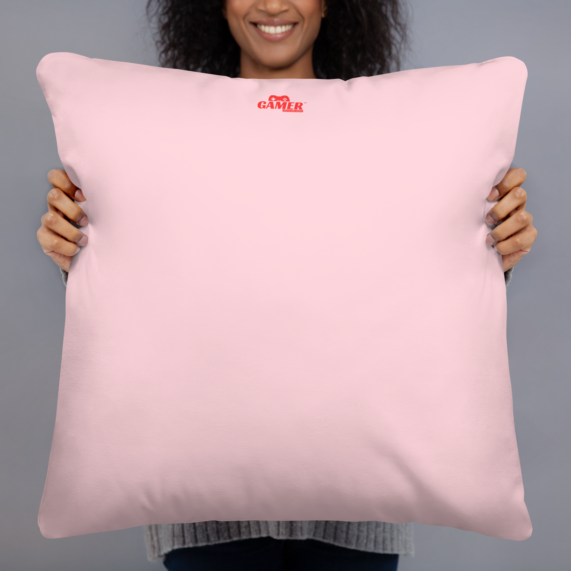 Gamer Gifts and Gear logo on back of light pink pillow