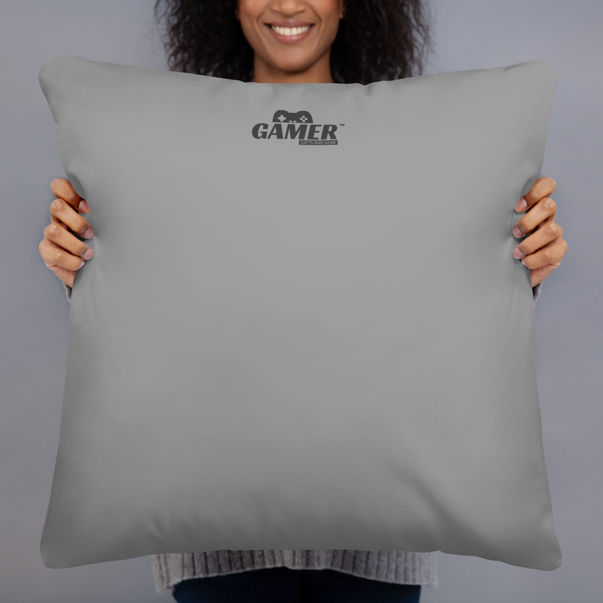 Gamer Gifts and Gear logo on back of grey pillow