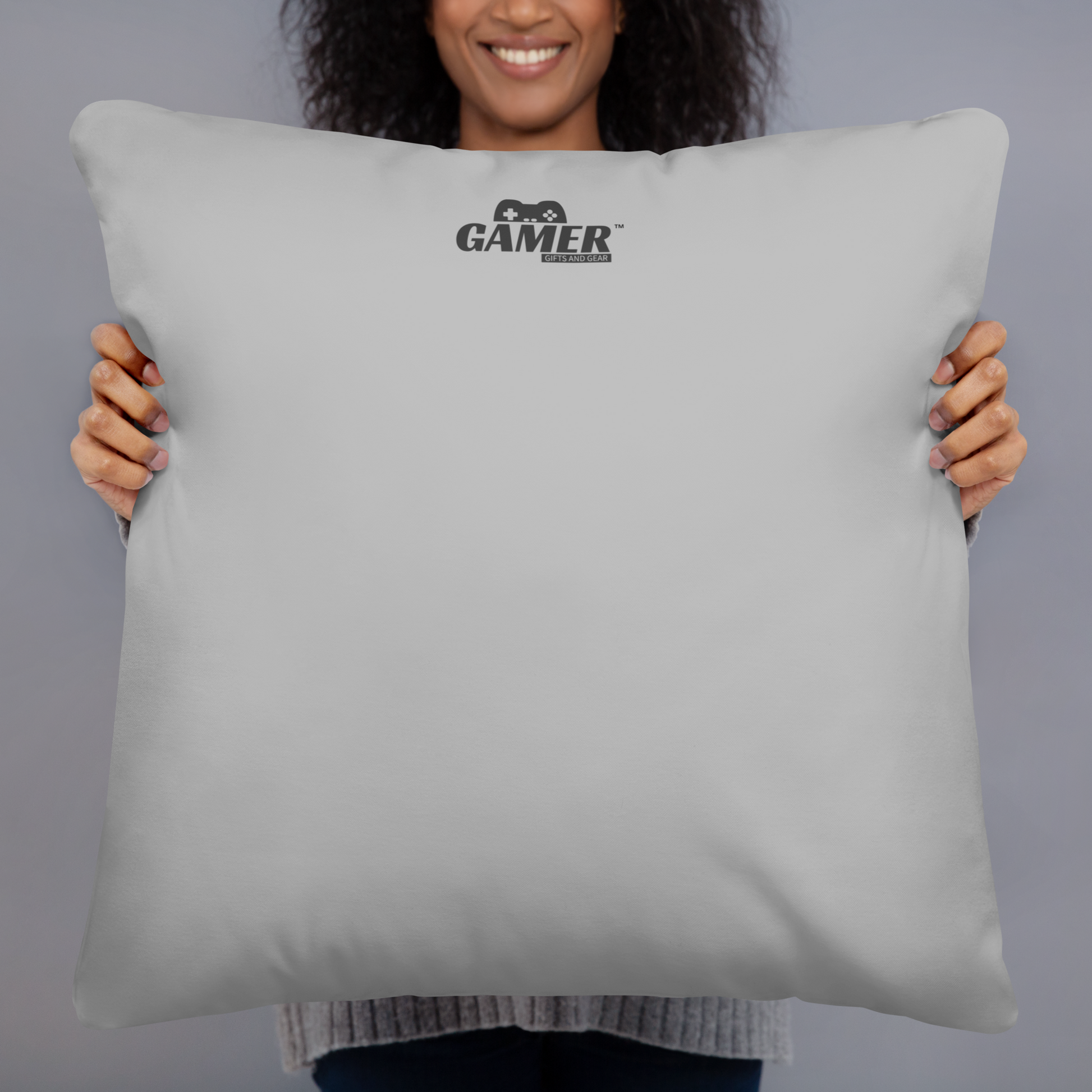 Gamer Gifts and Gear logo on back of light grey pillow