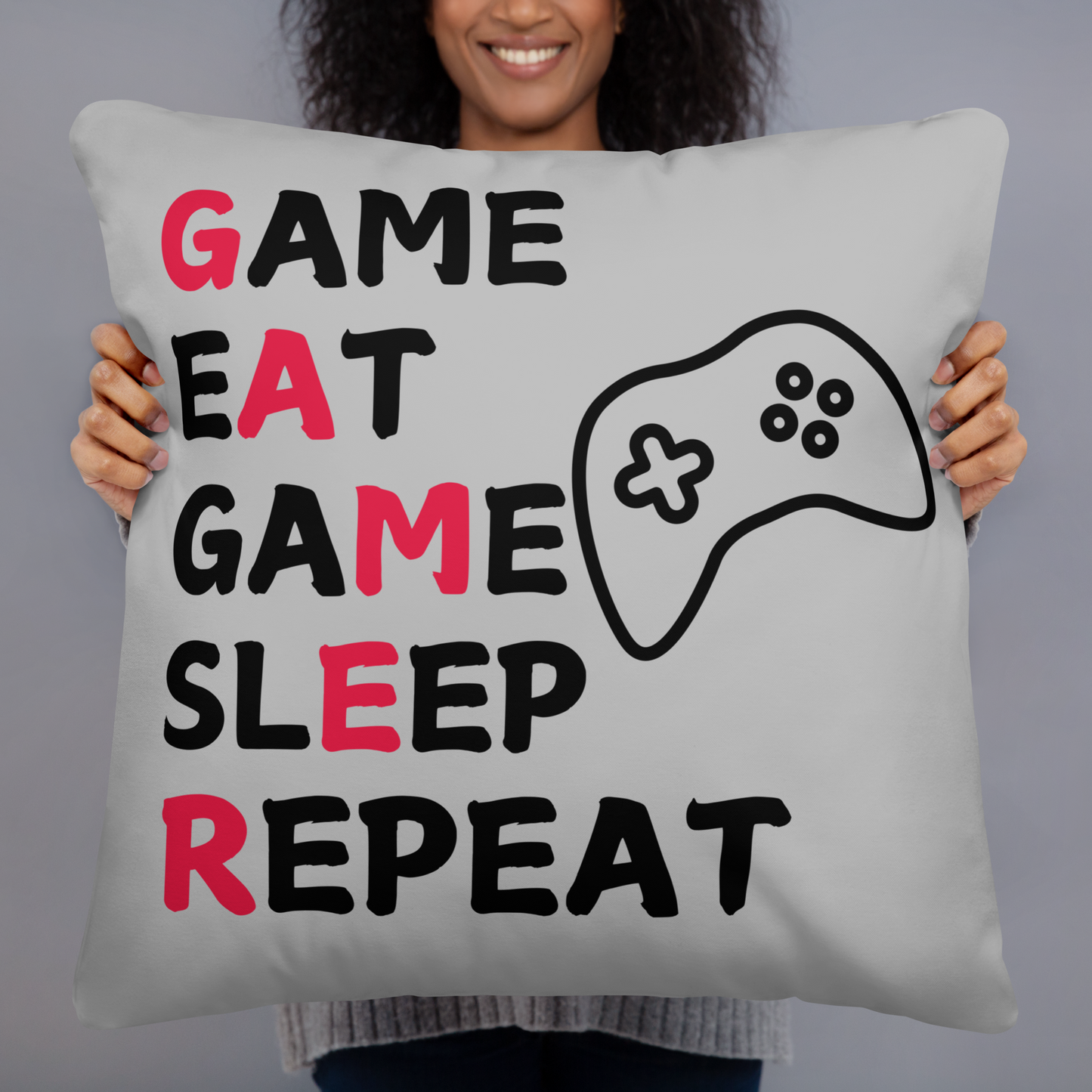 game eat sleep repeat logo on light grey pillow