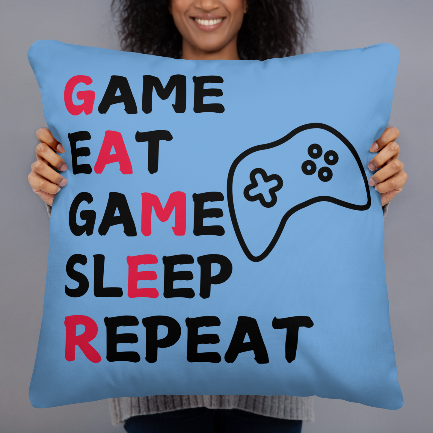 game eat sleep repeat logo on bright blue pillow