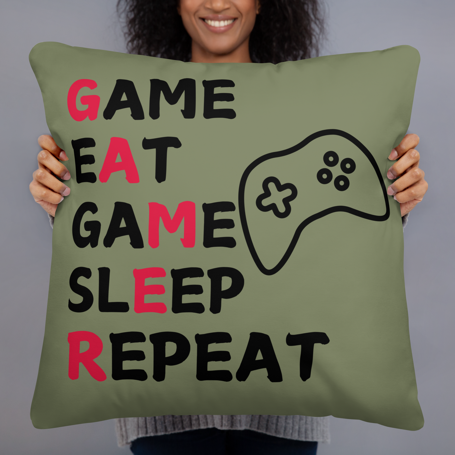 game eat sleep repeat logo on green pillow