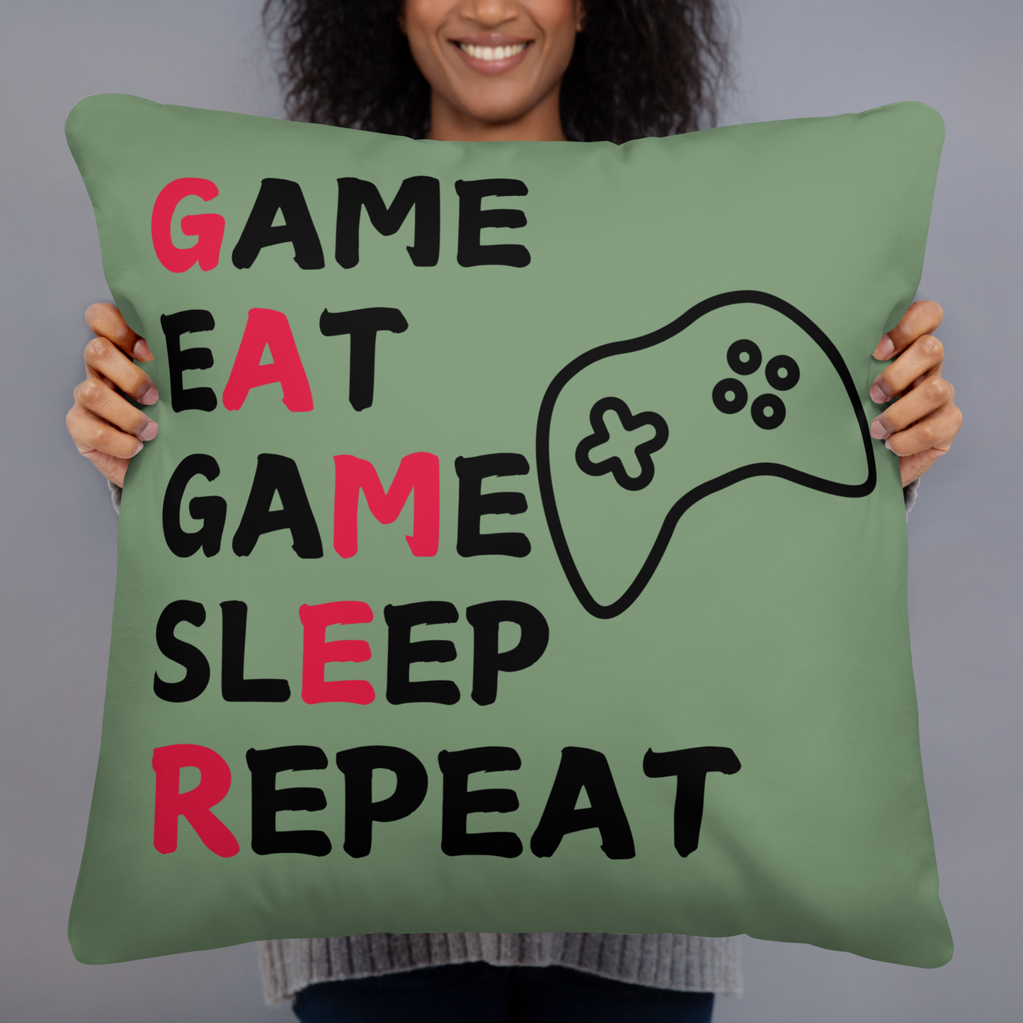 game eat sleep repeat logo on light green pillow