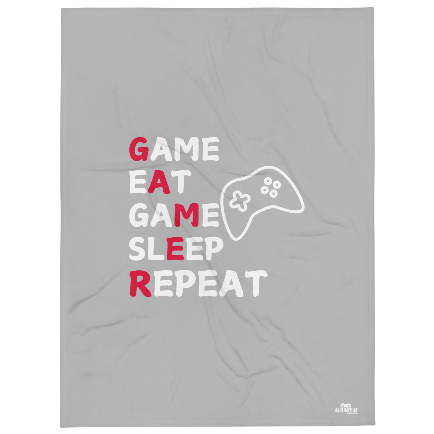 Game, Eat, Sleep Repeat Logo on a white mug with grey throw blanket