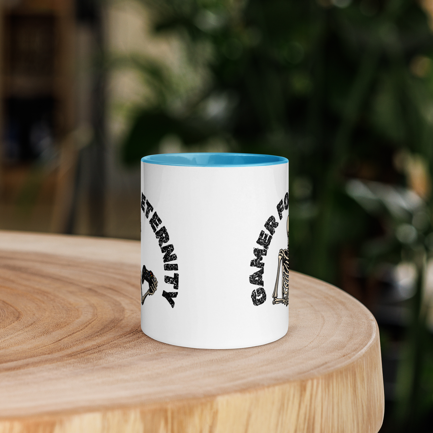 Skeleton Gamer for Eternity Logo on a White Mug with Blue handle and Blue inside