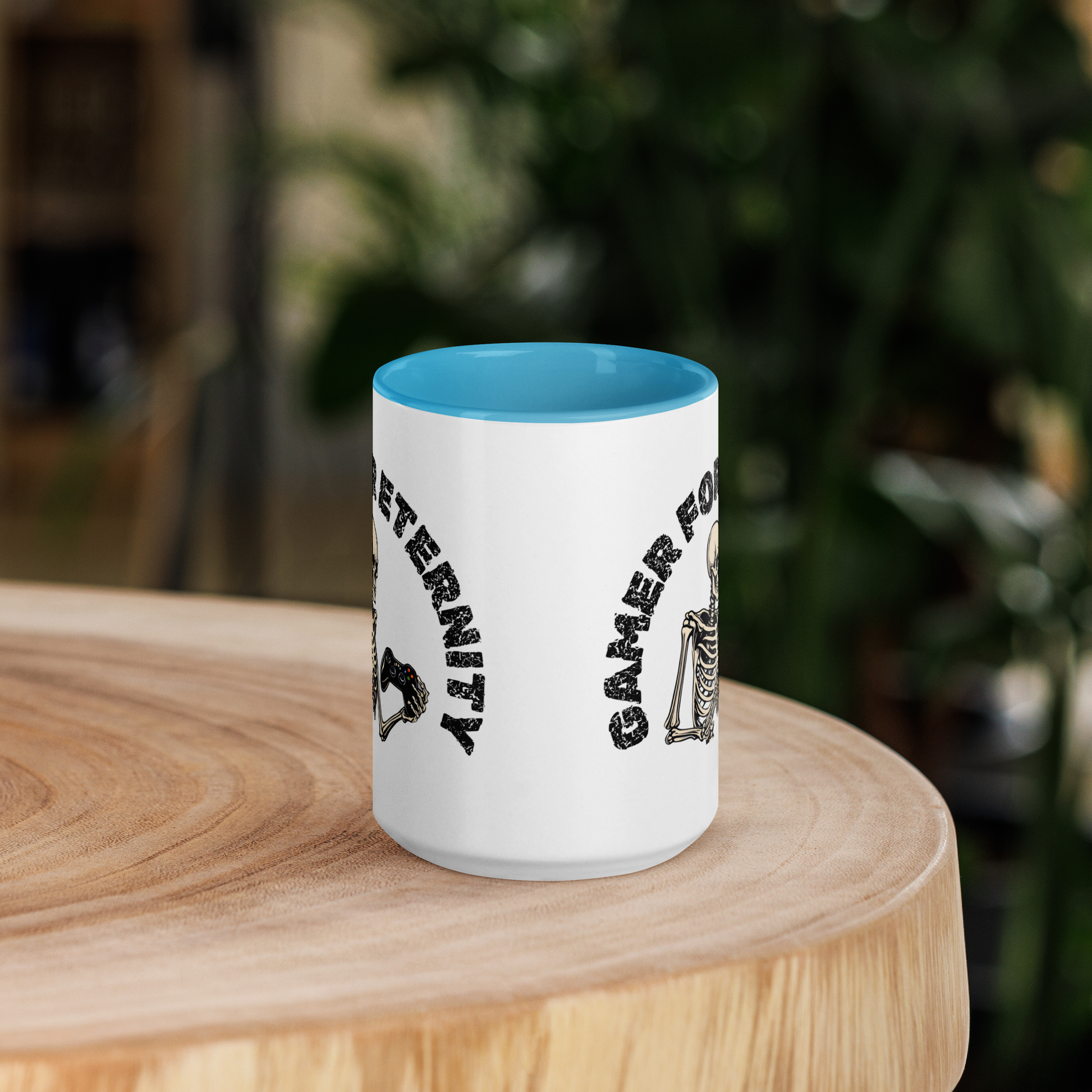 Skeleton Gamer for Eternity Logo on a White Mug with Light Blue handle and Light Blue inside