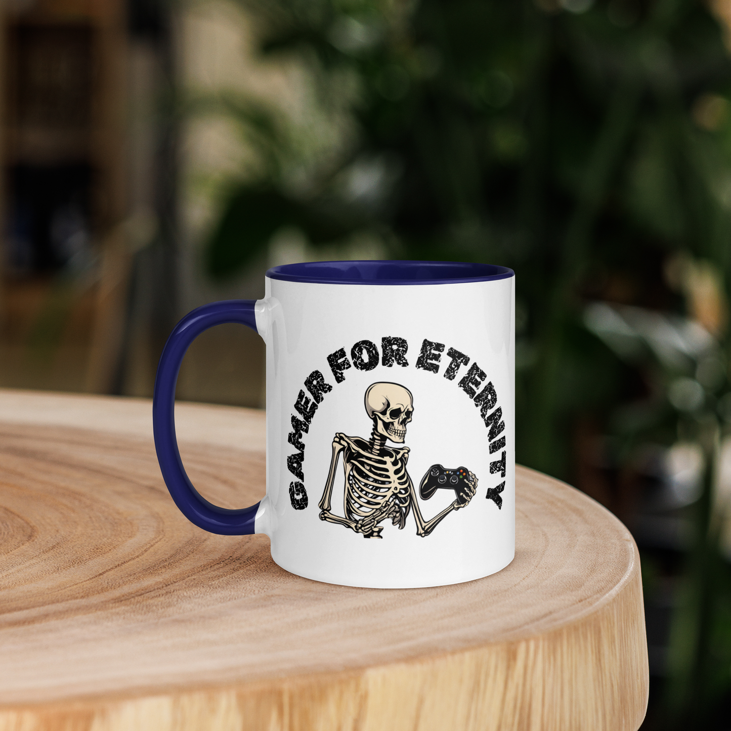 Skeleton Gamer for Eternity Logo on a White Mug with Dark Blue handle and Dark Blue inside